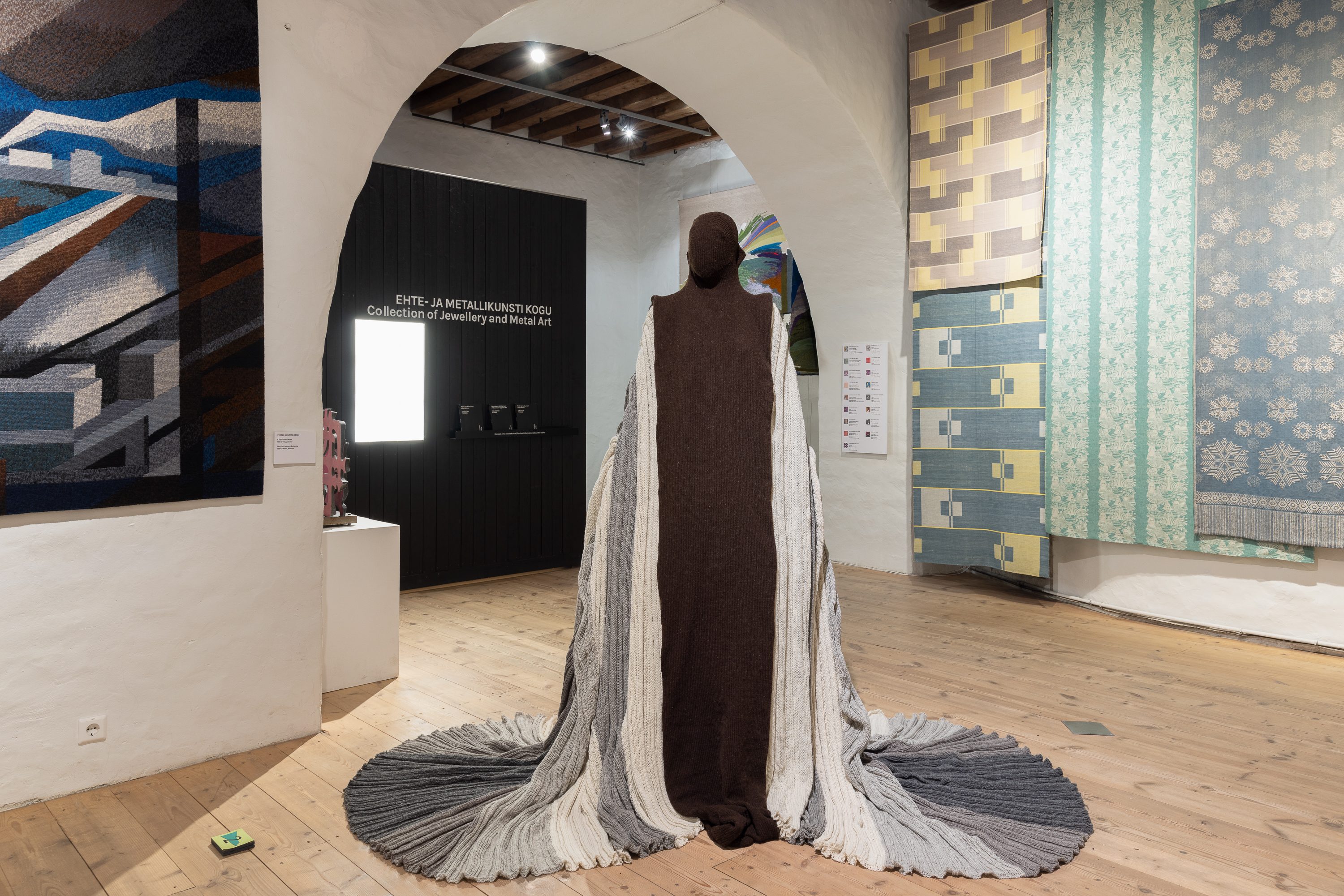Undyed wool sculpture resembling an Estonian woman – by Alyona Movko-Mägi