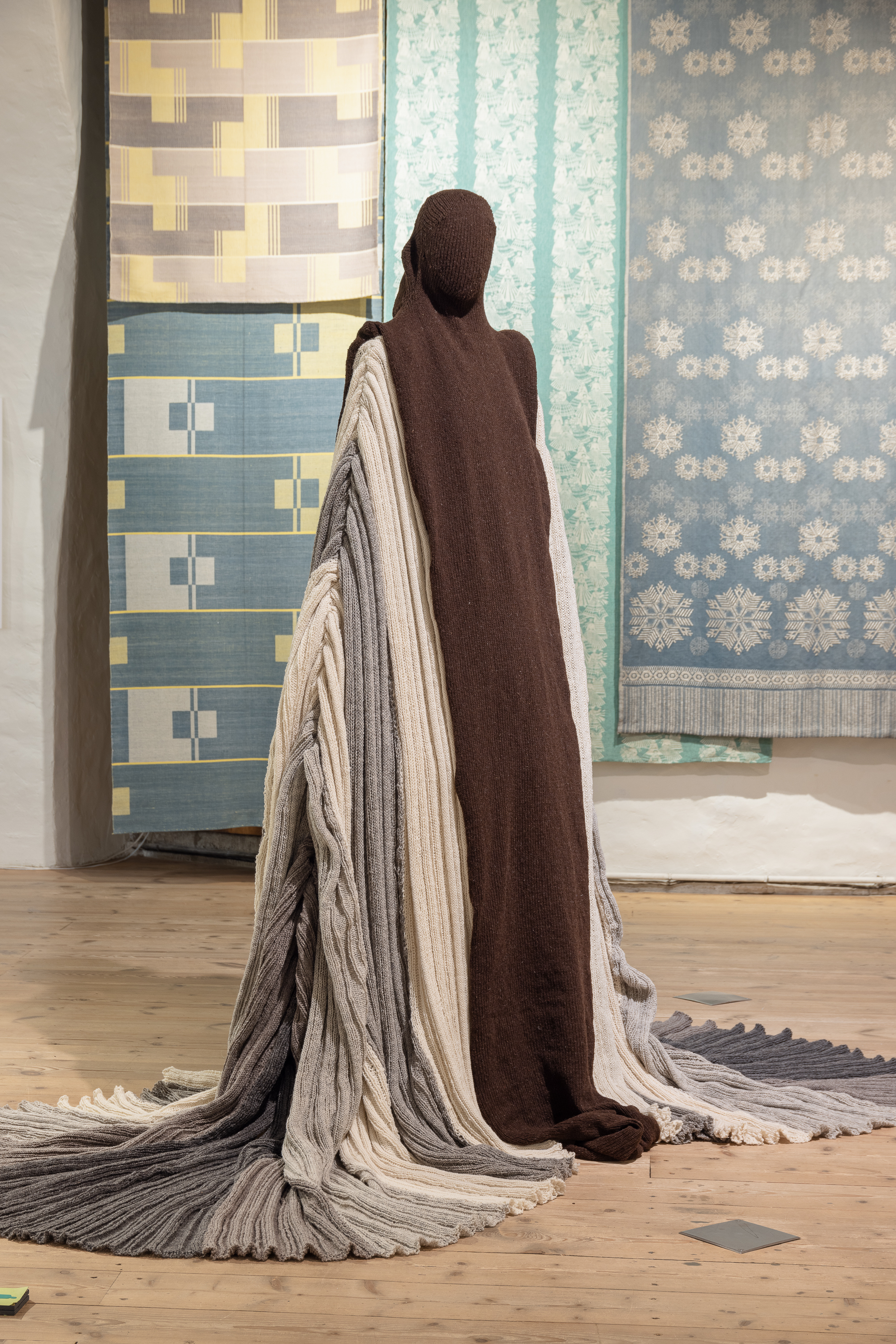 Undyed wool sculpture resembling an Estonian woman – by Alyona Movko-Mägi