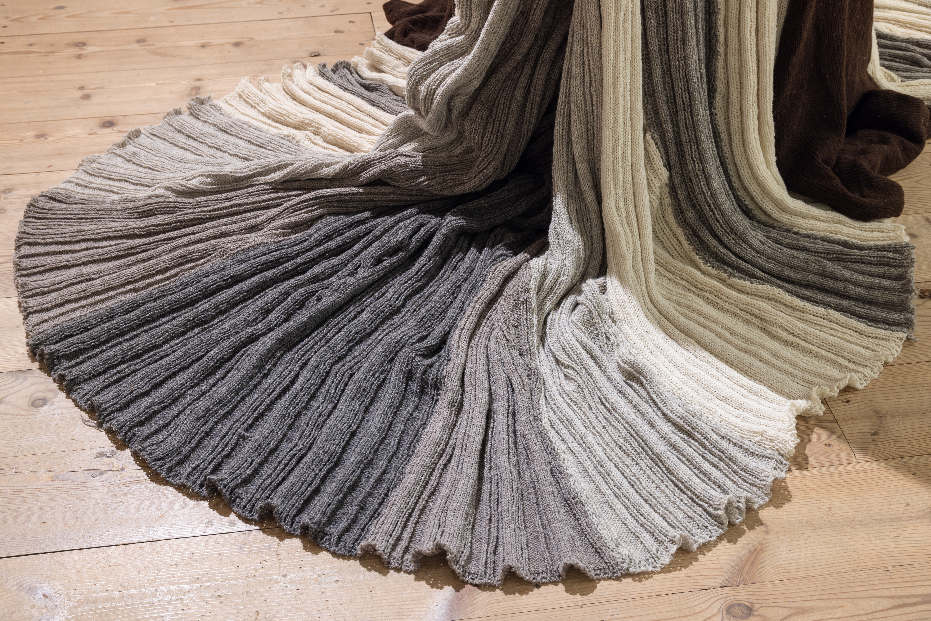 Close-up of hand-knit texture in raw undyed wool – by Alyona Movko-Mägi